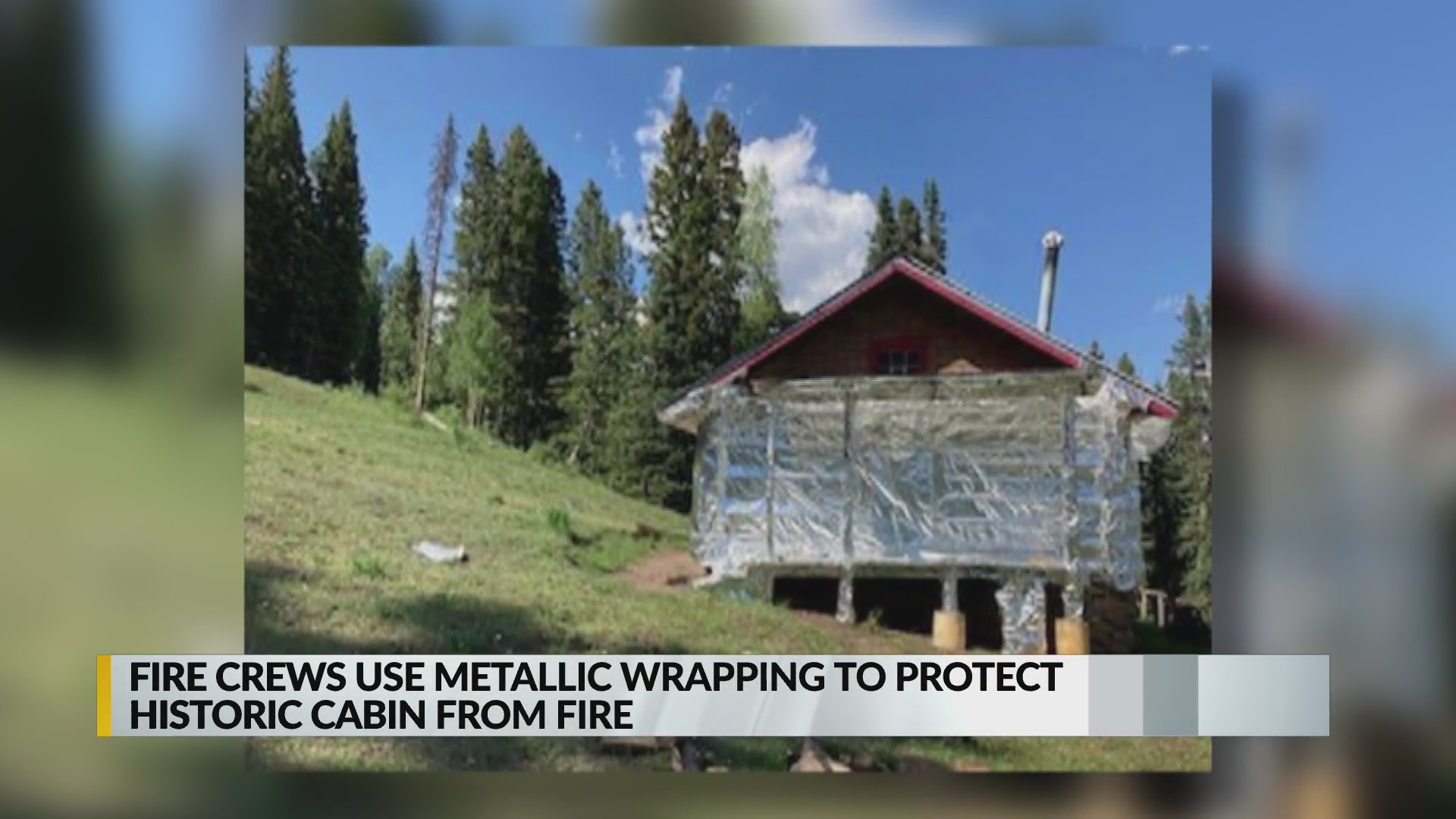 Crews use metallic wrapping to protect historic cabin from Rincon Fire